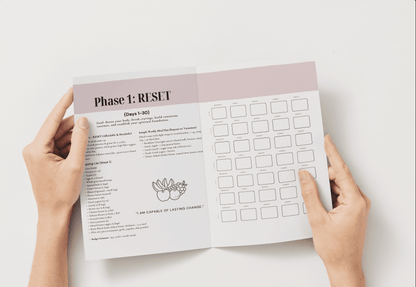 Open booklet from New Wave 90 Day: Mind, Body & Spirit Reset Transformation digital wellness program showing Phase 1 RESET plan and daily tracker chart.